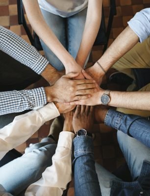 top-view-of-diverse-people-hands-holding-together-in-circle-hands-stack
